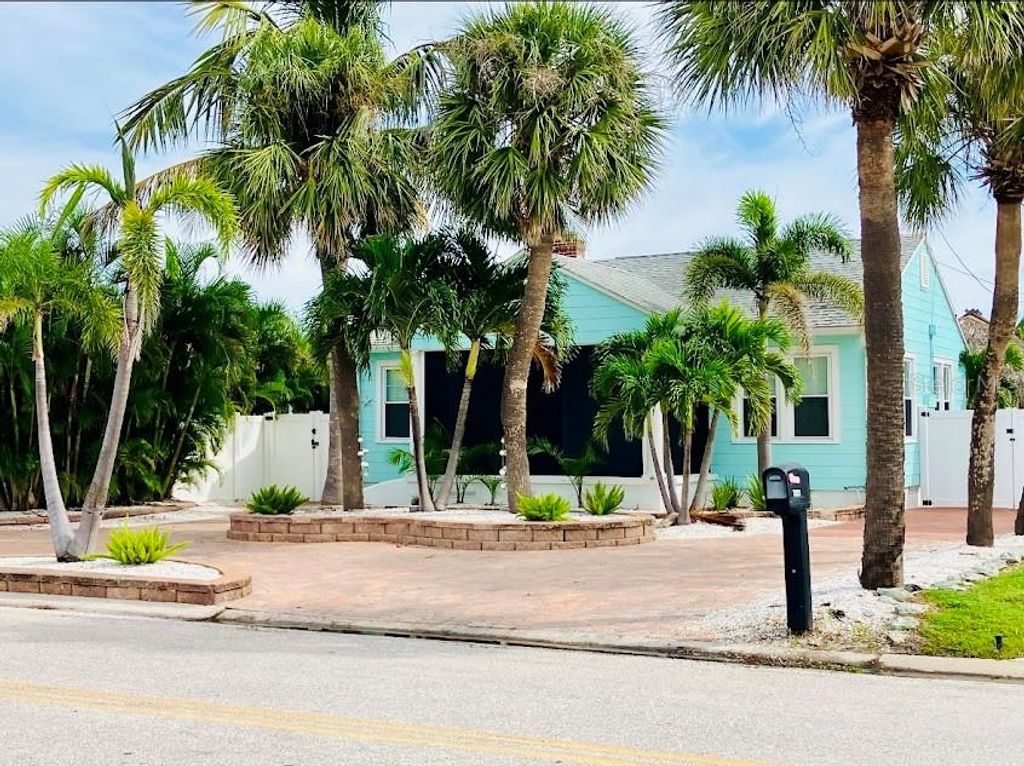 Photo of 7625 Coquina Way, St Pete Beach, FL 33706 (MLS # TB8432713)