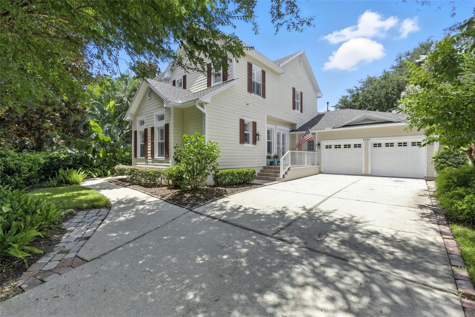 Keene’s Pointe - your opportunity to live in this beautiful community for a great price! Located on the 13th green of The Golden Bear Club, this one owner home offers a functional and spacious floor plan with 5 bedrooms and 4 baths. The first floor has a kitchen/great room area with gas fireplace, formal living and dining rooms, a bedroom with walk-in closet that can also be used as an office and a bonus room with wet bar, bath and separate entry that can function as an in-law suite, second primary suite or game room. The second floor has the primary suite, two additional bedrooms with walk-in closets, bath and a charming porch overlooking the front yard and community pond. Charming covered screen porches accent the front and back of the house and offer beautiful sunset views. Lush back yard with plenty of room for a future pool. A clean slate ready for you to customize and make your own, this home has a new roof in 2024, plantation shutters, shallow well for irrigation, oversized 2-car garage with attic access and additional space for a golf cart or storage, and much more! Be sure to view the virtual tour for the floor plan. This home will not last long!