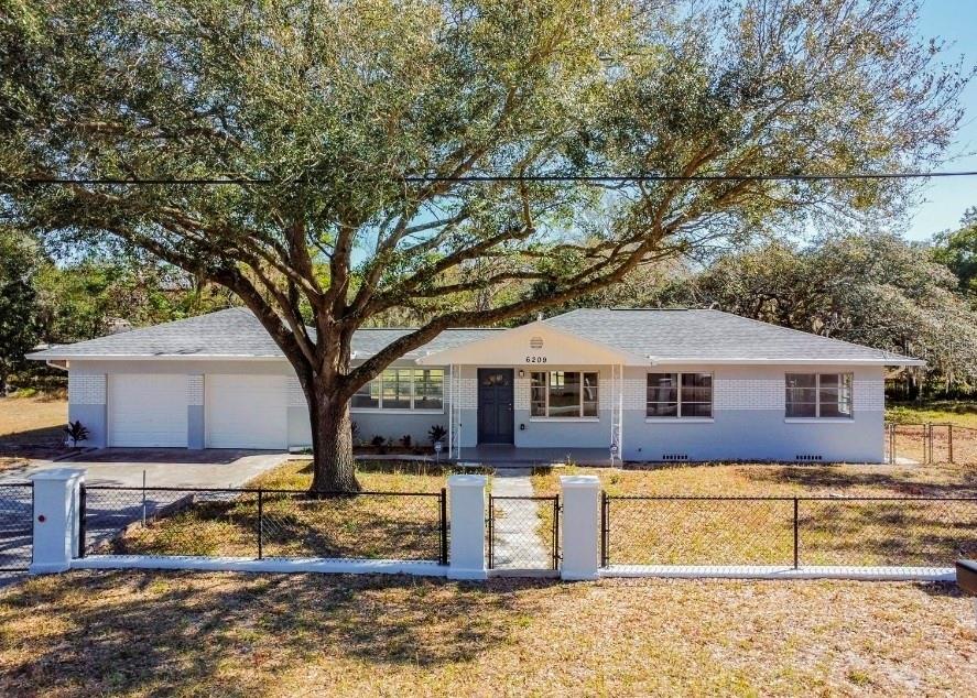 Photo of 6209 N 48th Street, Tampa, FL 33610 (MLS # TB8560112)