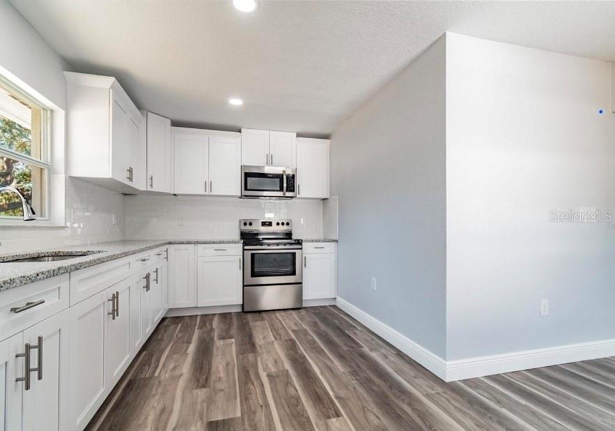Photo of 6209 N 48th Street, Tampa, FL 33610 (MLS # TB8560112)