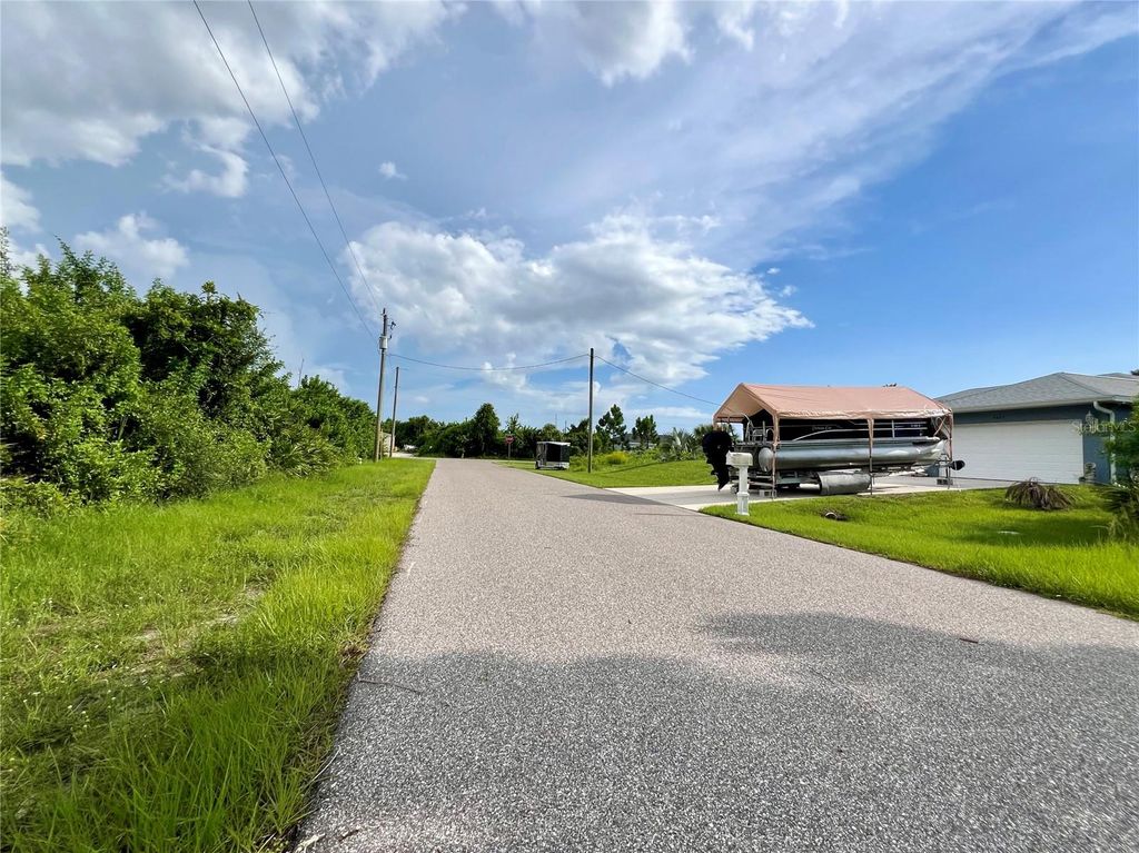 Photo of 5602 Eyerly Terrace, Port Charlotte, FL 33981 (MLS # C7493745)