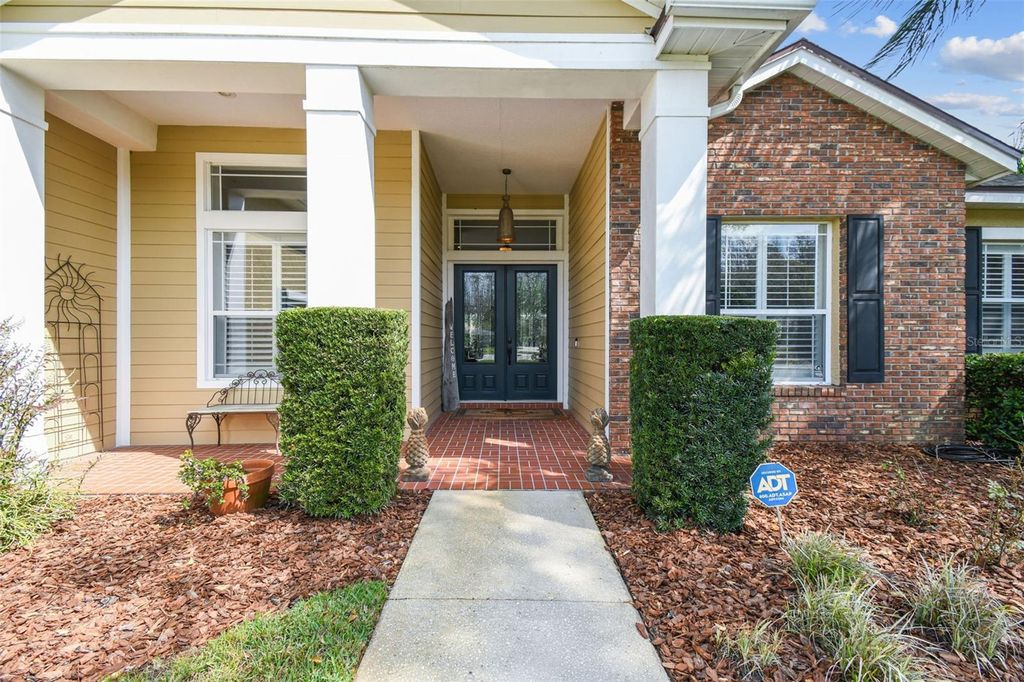 Photo of 1404 KENSINGTON WOODS DRIVE, LUTZ, FL 33549 (MLS # T3436737)