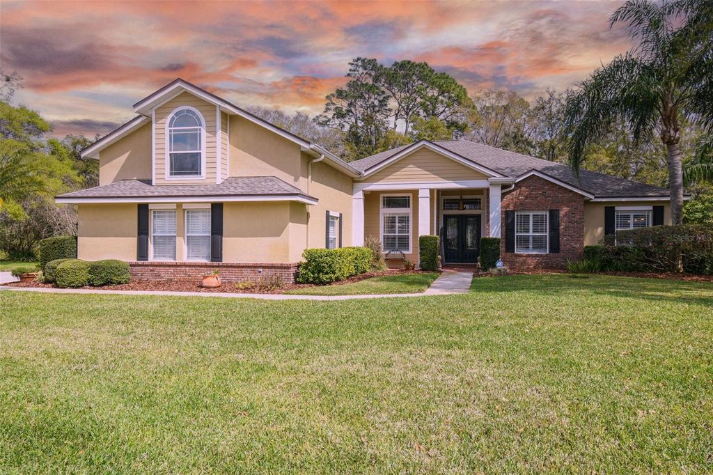 Photo of 1404 KENSINGTON WOODS DRIVE, LUTZ, FL 33549 (MLS # T3436737)