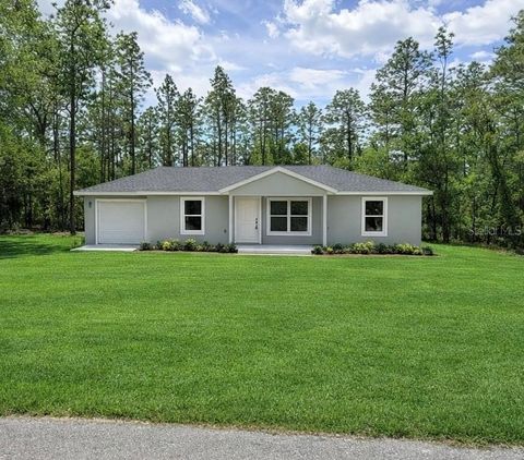 Photo of 24352 NW Hemlock Avenue, Dunnellon, FL 34431 (MLS # OM718892)