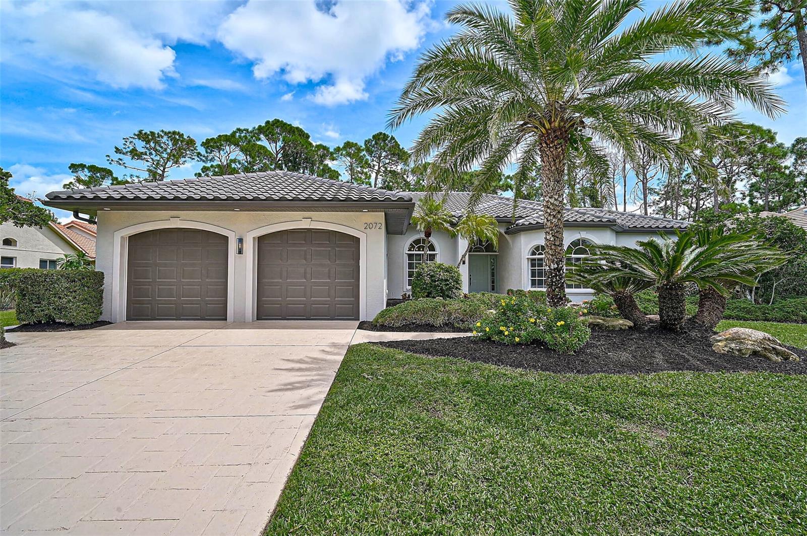 Welcome to your dream home in the highly desirable gated Calusa Lakes Golf Club community in Nokomis, Florida. This brand new, top to bottom meticulously gut-renovated, 4-bedroom, 2.5-bathroom single-family residence spans 2,578 square feet, and showcases precisely curated design throughout. The home features a private pool, and hurricane shutters for added peace of mind.
Step inside to custom tile flooring that flows seamlessly throughout the home. The gourmet kitchen, designed with precision, boasts quartz countertops, premium top-of-the-line appliances including a wine refrigerator, custom wood cabinetry, marble backsplash, and a convenient pot filler for effortless cooking. The adjacent family room creates a warm ambiance with an electric insert fireplace, perfect for cozy evenings.
The primary suite is a private oasis overlooking the sparkling pool, complete with custom wood shelving in the spacious walk-in closets. The spa-inspired primary bathroom, crafted with meticulous attention to detail, features quartz countertops, a large walk-in shower, a separate soaking tub, and a towel warmer for added comfort and luxury.
The outdoor pool area is designed for seamless entertaining, with ample under-roof space for al fresco dining and relaxation, all set on a highly private lot that ensures peace and seclusion. The two-car garage is enhanced with a split AC system and epoxy-finished flooring, providing a polished and comfortable space.
Located in the sought-after Calusa Lakes community, enjoy low HOA fees of $327 quarterly, no CDD fees, tennis courts, and the flexibility of optional membership to the semi-private 18-hole golf course- no obligation to join. Perfectly positioned off I-75 (Exit 195) and Tamiami Trail, this home is minutes from Nokomis Beach, Siesta Key, and the vibrant dining, shopping, and cultural scenes of Venice and Sarasota. This exquisite home blends modern elegance, meticulously considered renovations, storm-ready features, and an unbeatable location. Schedule your private tour today!