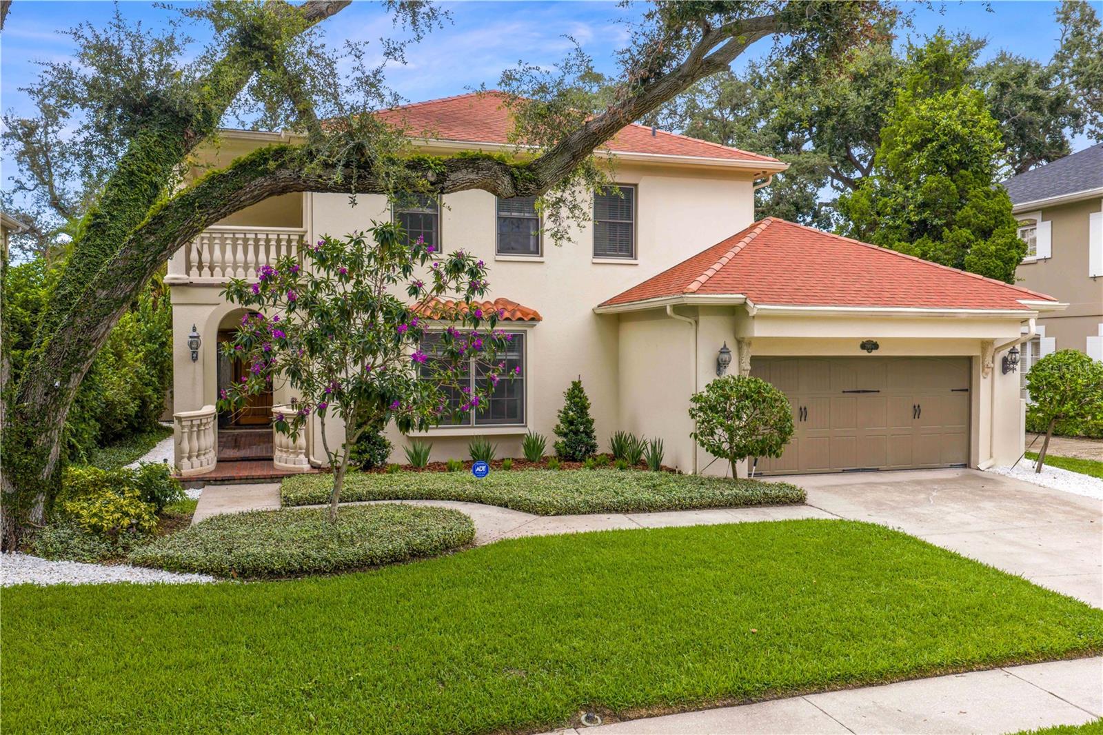 Just 7 homes from Bayshore Boulevard, this Spanish Style home is located on a quiet, tree lined street in Bayshore Beautiful. With almost 3,300 square feet, 4 bedrooms and 3.5 baths, two-story foyer entryway, two large living rooms, and two outdoor entertaining areas, you will love the flow and feel of this home. The home features hardwood flooring throughout, crown molding, new tile roof in 2010, and a turfed backyard. The kitchen is open to the dining area overlooking the patio and has KitchenAid appliances, including an induction range, refrigerator, microwave and dishwasher. French doors lead to the expansive brick outdoor courtyard with built-in grill, and an additional covered porch in the back of the home from the family room that leads to the fenced backyard. All four bedrooms are located on the second floor, with a spacious primary bedroom and bath that offers double sinks, a separate soaking tub and shower, and custom walk-in closet. The covered porch off the master bedroom is a great retreat and offers views of the neighborhood that makes you feel like you are among the treetops. This home and yard are perfect for family gatherings and entertaining and located close to local restaurants and shopping.