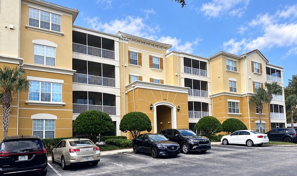 Photo of 3368 Robert Trent Jones Drive #40108, Orlando, FL 32835 (MLS # O6445097)