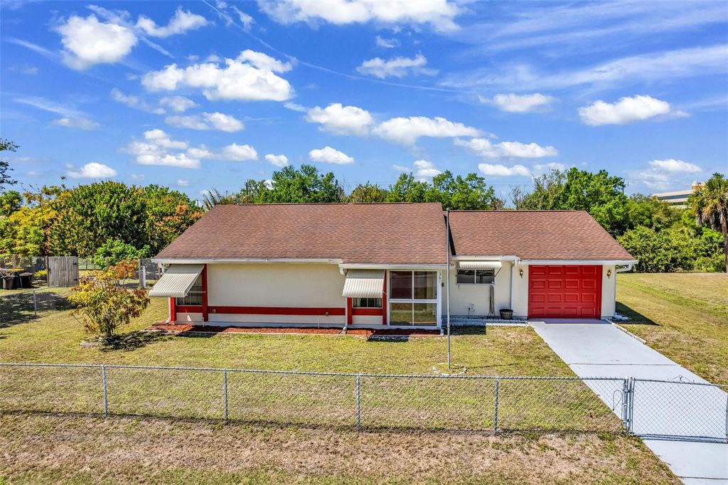 Photo of 1361 Frizzell Lane NW, Port Charlotte, FL 33948 (MLS # C7523873)