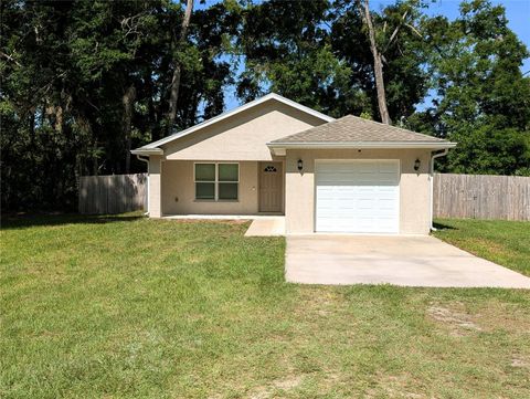 Photo of 13296 SE 33rd Court, Belleview, FL 34420 (MLS # OM723161)