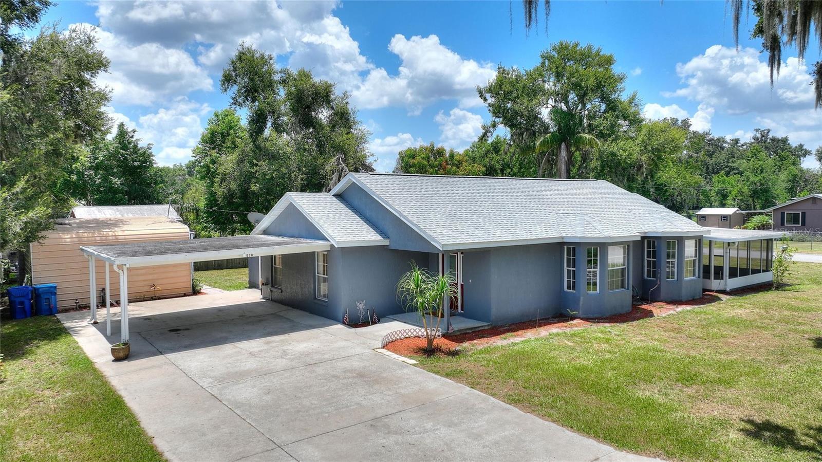Charming 3-Bedroom Home with Water Views in Fort Meade!...Don't miss this spacious family home perfectly situated on a corner lot directly across from Patterson Park. Enjoy peaceful water views from the comfort of your living room, dining area, or while relaxing on the screened patio overlooking the park...This well-designed home offers 3 bedrooms, 2 bathrooms, and a desirable split-bedroom floor plan. The open living room and separate family room provide plenty of space for entertaining or casual family gatherings. The generously sized primary suite features a walk-in closet and private ensuite and is conveniently located off the kitchen and dining area...Two guest bedrooms are located on the opposite side of the home, flanking the full guest bath for added privacy. The laundry room is located just off the family room and includes an exterior access door for added functionality...Step outside to the screened patio, ideal for enjoying the serene views and fresh air. A large backyard storage shed offers plenty of room for tools and yard equipment...Enjoy peace of mind knowing that the ROOF WAS REPLACED IN 2023! Located in a quiet, established neighborhood with scenic surroundings and just minutes from shopping, schools, and downtown Fort Meade. This lovely home offers comfort, convenience, and charm—schedule your private showing today!