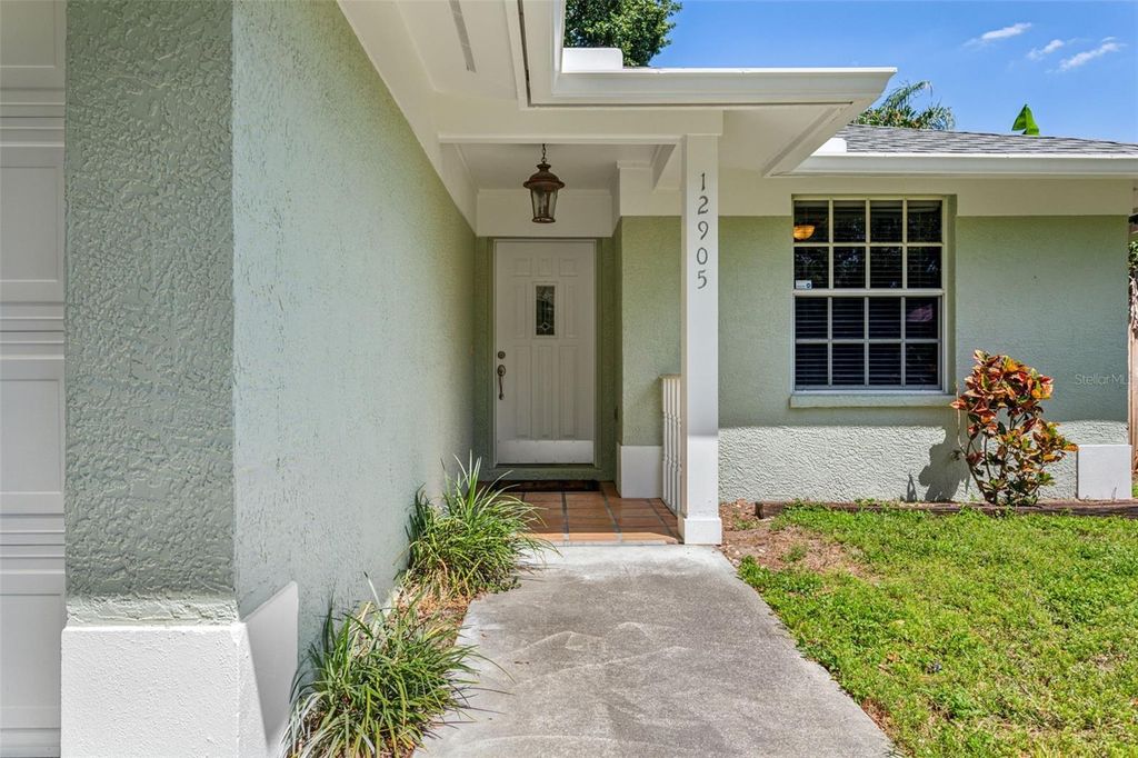 Photo of 12905 Woodleigh Avenue, Tampa, FL 33612 (MLS # T3520265)