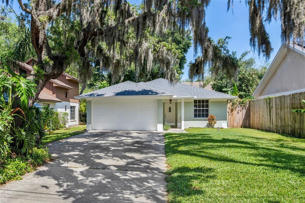Photo of 12905 Woodleigh Avenue, Tampa, FL 33612 (MLS # T3520265)
