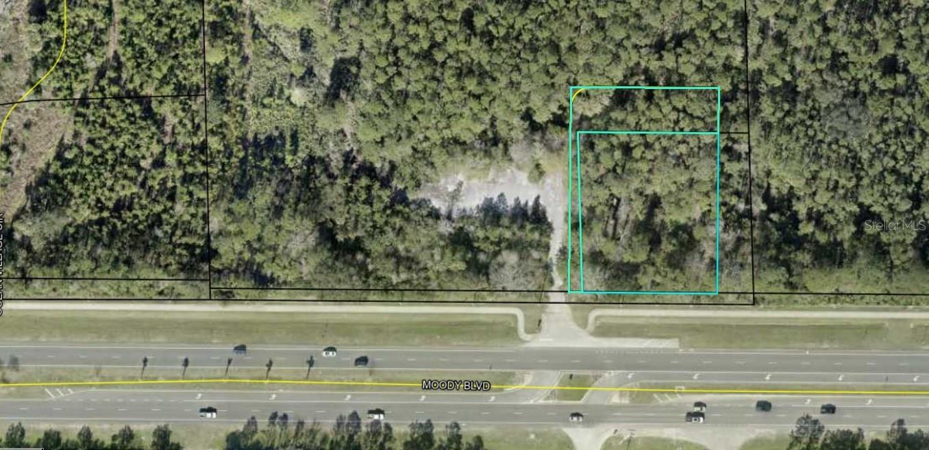 Prime parcel on SR 100 just west of the intersection with Colbert Lane. This sale includes the adjacent .28 acres (Parcel id 11-12-31-0650-000B0-0084). Zoned COM-3, this land offers development possibilities from office to retail to light industrial. Total of 1.03 acres is completely buildable. This area is rapidly growing with yet another new apartment property under construction just around the corner on Colbert Lane. Location is less than .5 miles from Publix anchored center. AADT counts are 20-25K vehicles. Great exposure with 180 ft of frontage on SR100 and just 2 miles off exit 284 for I-95. Palm Coast is one of the top ten fastest growing counties in FL and is located midpoint between Jacksonville and Orlando.