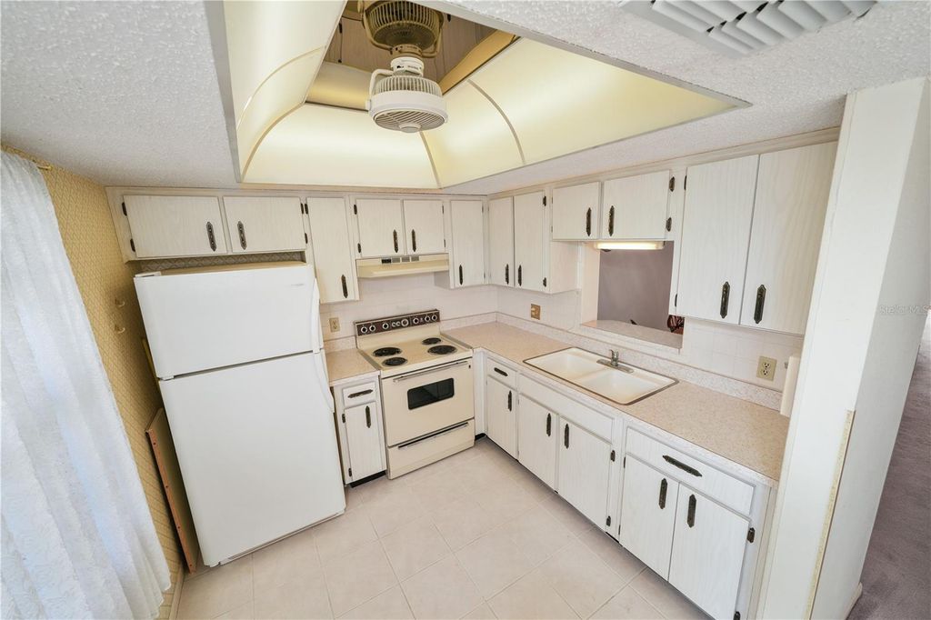 Photo of 1450 Heather Ridge Boulevard #307, Dunedin, FL 34698 (MLS # TB8491283)