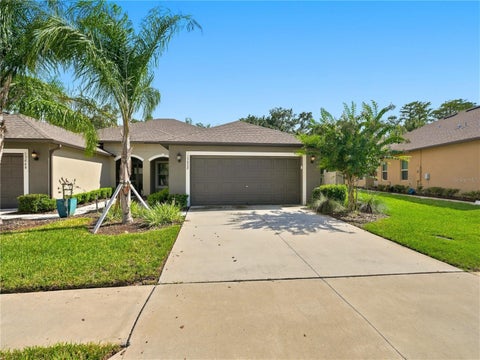 Photo of 13432 Crest Lake Drive, Hudson, FL 34669 (MLS # TB8544789)