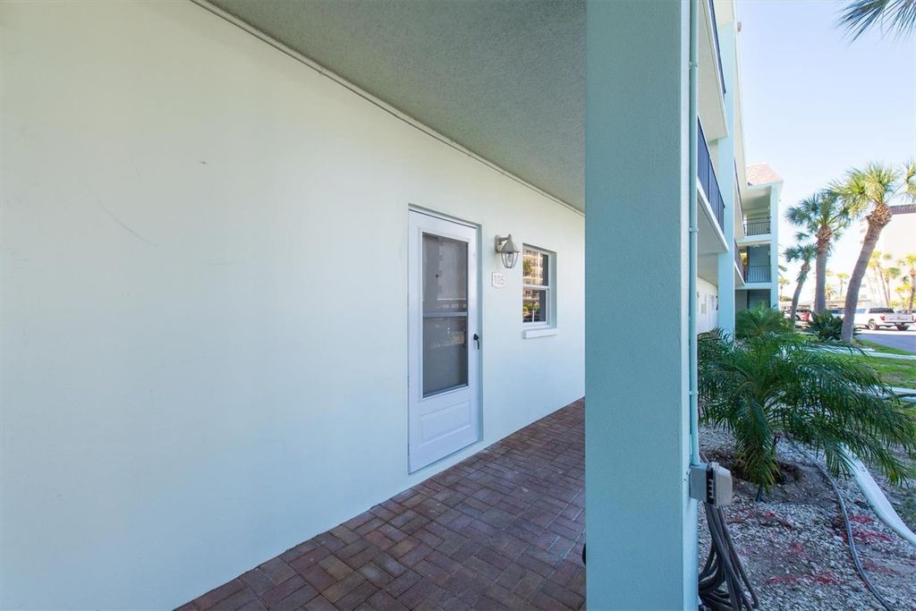 Photo of 8 Glencoe Place #105, Dunedin, FL 34698 (MLS # W7883444)