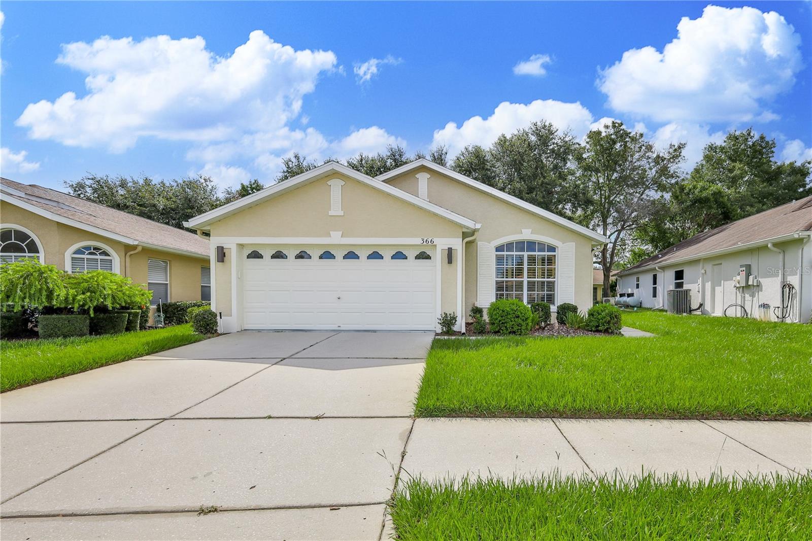 Lovely 2/2/2/ PLUS DEN located in upscale 55+ Community with all the amenities. Well cared home with 1,497 sq. ft. of living space situated on oversized, premium lot with open, beautiful, park-like view. Enter the foyer and tucked away for privacy are Double Doors leading to the den, large enough to be home office or TV Room. Great Room with Vaulted Ceiling Measures appx. 18’x 25' with laminate flooring, plant shelves for architectural detail, and slider to the enclosed lanai. Split plan offers Primary bedroom with large walk-in-closet, bath with walk-in-shower. Great closet space, architectural arches for your artwork. Kitchen with Wood Cabinets, plenty of counter space & Raised Breakfast Bar. Awesome Corian Counters and Sink and stone backsplash with glass inserts. Cabinets equipped with pull-out drawers for extra convenience. Guest Bedroom is tucked away giving guests privacy and nearby 2nd bath. Inside Utility Room with Washer & Dryer, included with the home, utility sink and wood cabinets for plenty of storage. New Roof will be installed by HOA 2026 – you get to pick the color. Hot Water Heater under 2 years, Custom Plantation Shutters on widows throughout.
You will enjoy the lifestyle and luxury afforded by this community with 24 hour-guard, gated, 18,000 Sq. Ft. Clubhouse with ball room, Restaurant, Billiards, Fitness, Library, Heated Pool, Spa, Bocce, Tennis, Pickleball and more. Community just completed all new road paving. Sidewalks for walking and you will enjoy the extraordinary landscaping all along the community. Your fees include, lawn maintenance, exterior painting, sprinkler system maintenance, fiber optic internet, and Streaming. All just 45 minutes from Tampa and close to local beach/kayaking, and Fishing.