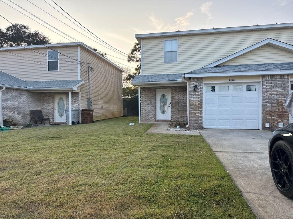 Photo of 2127 Tom Street #2127, Navarre, FL 32566 (MLS # O6400254)