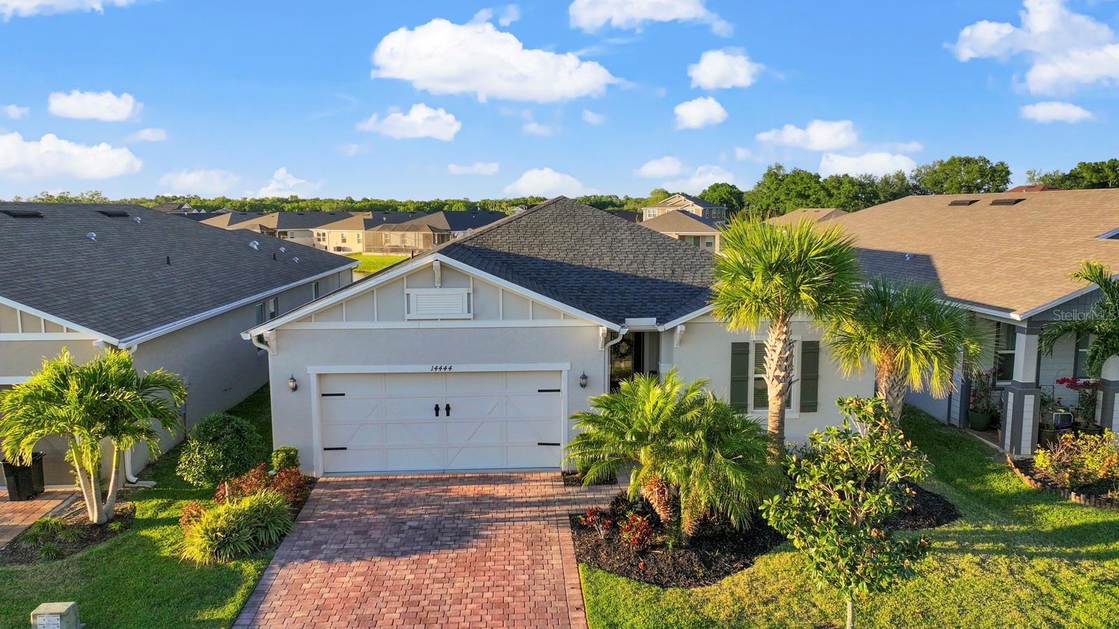 HUGE PRICE REDUCTION! WOW! Discover Florida living in this 4-bedroom, 2-bath, lakefront home in Avaunce, a gated community nestled in the heart of vibrant Lakewood Ranch. Built by renowned builder KB Home, this 2,006 sq ft modern gem offers no CDD fees, low $124/month HOA dues, and unmatched Southwest Florida convenience. Step into this Energy Star Qualified home, featuring an open-concept design and luxurious tile flooring throughout, as well as amazing custom closets and new ceiling fans. The gourmet kitchen dazzles with elegant quartz countertops, 42-inch soft-close cabinetry, stainless-steel Whirlpool appliances, and a large quartz island for entertaining. The great room flows seamlessly to a screened-in lanai, opening to a generous backyard with a large custom paver area boasting lake views, ideal for sunbathing, cookouts, and outdoor gatherings. The backyard can be fenced per HOA guidelines and overlooks the serene waterfront. The primary suite is a private retreat with double sinks, a walk-in shower, and a large walk-in closet. Three additional bedrooms, a well-appointed second bath, and a laundry room with washer/dryer included ensure comfort and convenience. Energy-efficient features like LED lighting, Moen faucets, Kohler showerheads, and a modern HVAC system keep utility costs low and promote sustainable living. Avaunce, a boutique community of 139 homesites by KB Home, offers gated living with low $124/mo fees, steps from a sparkling pool with a cabana for relaxation and a key-coded gated entry for security. Pet-friendly and steps from the pool, this home stands out. No Community Development District (CDD) fees save thousands annually while accessing top amenities. Located off SR 70 and Lorraine Road, this home is just 1 minute from Lakewood Walk plaza, featuring Publix, Dunkin’ Donuts, First Watch, Wawa, and Walgreens. Lakewood Ranch, an award-winning master-planned community spanning Manatee and Sarasota counties, boasts 9 golf courses, miles of scenic trails, and a Main Street with unique boutiques, dining, and entertainment. Year-round events, from farmers’ markets to vibrant festivals, build community spirit. Explore the Premier Sports Campus (1 mi) or Greenbrook Adventure Park (1.9 mi) for family-friendly fun, or shop at University Town Center (7.7 mi). Nathan Benderson Park (8.5 mi) offers rowing and outdoor activities, while downtown Sarasota (18.1 mi) beckons with eclectic dining and culture. Beaches like Lido Key (21 mi) and Siesta Key (23 mi) are a short drive, as is Sarasota-Bradenton International Airport, a Southwest Florida hub (15-20 min). I-75 (5 mi) connects you to Tampa and St Petersburg. Families will love the proximity to A-rated schools, including Gullett Elementary, R. Dan Nolan Middle, and Lakewood Ranch High, all within a mile. Higher education options like Keiser University, State College of Florida, and LECOM are nearby for professionals and students. This lakefront 4-bedroom home, steps from the sparkling pool, offers great value with no CDD fees—a rarity in Lakewood Ranch. A paver driveway enhances curb appeal, complementing KB Home’s winning style (2019 Parade of Homes winner for plan, kitchen, appeal) and California-inspired architecture. Its prime location near schools and shopping, with serene lakefront views, guarantees lasting value. Move-in ready and positioned for a luxurious lifestyle, this Avaunce gem is your slice of paradise. Schedule your private showing today!