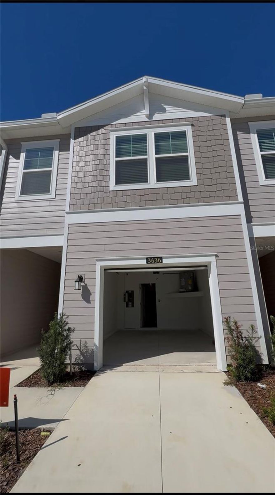 Be the first to live in this brand new townhome for rent in Oak Hammock Preserve in Ocala. This modern two story layout offers three bedrooms, two and a half bathrooms and an open concept living space filled with natural light. The kitchen features stainless steel appliances, quartz countertops, a breakfast bar and ample cabinet storage as well as a closet pantry, creating a clean and functional space for everyday living.
Upstairs, you will find all three bedrooms along with a versatile loft that can be used as an office, media space or lounge area. The primary suite includes a walk in closet and a private bathroom with double sinks and a glass enclosed shower. The laundry area is conveniently located on the second floor.
Step outside to the covered lanai to relax and enjoy the private outdoor setting. There are no rear neighbors and the property backs to a conservation area, offering added privacy and a peaceful view. Home includes an electronic lock and camera doorbell for convenience.
Oak Hammock Preserve is located near shopping, dining and major roadways, providing everyday accessibility and ease. Zoned for an A rated high school. Everything is move in ready and brand new, offering a comfortable low maintenance living experience. High speed internet included!
Schedule your showing and secure your new home in one of Ocala’s newest and most convenient townhome communities.