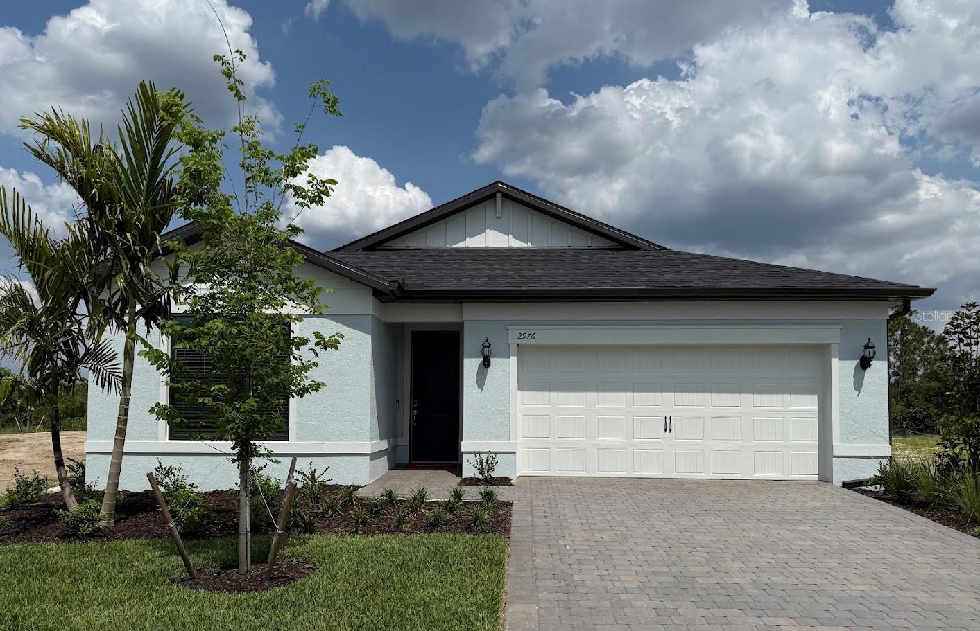 Available Now at The Strand at Cedar Grove. This beautiful Cresswind floorplan is a brand-new 3-bedroom, 2 -bathroom single-family home featuring 2 car garage on a private wooded homesite. Designed everyday living, this home offers an open layout with two sliding glass doors to the outdoor screened lanai. The kitchen is equipped with white cabinetry, quartz countertops, and stainless-steel appliances, impact glass windows, smart home package and more. The Strand at Cedar Grove, located in North Port, offers new constructed homes designed to fit your lifestyle and budget. Families looking for exceptional schools, open concept living, and community amenities like a neighborhood pool, pool cabana, and tot lot play area will find The Strand is the perfect place to call home.