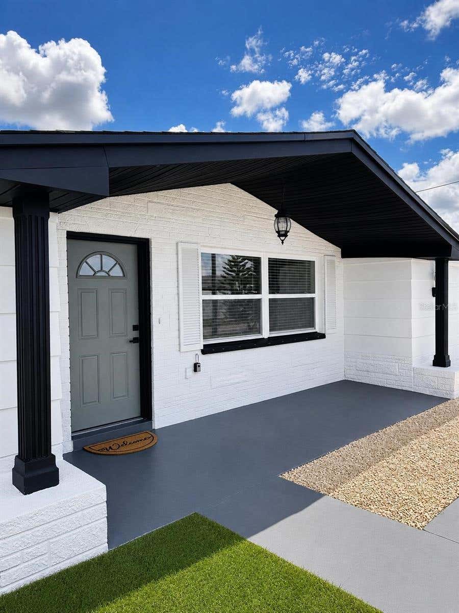 Photo of 1346 Chancellor Drive, Holiday, FL 34690 (MLS # O6436018)