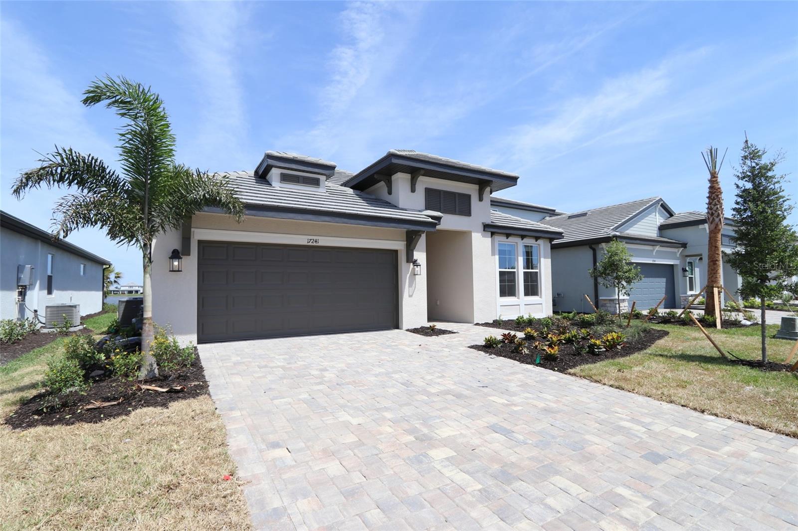 ****SPECIAL FINANCING AVAILABLE FOR A LIMITED TIME ONLY FROM PREFERRED LENDER. RESTRICTIONS APPLY, FOR QUALIFIED BUYERS, SUBJECT TO APPLICABLE TERMS AND CONDITIONS. SUBJECT TO CHANGE WITHOUT NOTICE****
Welcome to the Calusa. Boasting over 2,100 square-feet, this stunning four-bedroom, three-bathroom home is now available for sale.
Located in a prime area, this property offers a spacious and modern living experience. Step inside this single-story home and prepare to be impressed by the high-quality craftsmanship and attention to detail. There is plenty of room for you and your loved ones to spread out and enjoy.
The kitchen in this home features ample counter space and a sleek design that will make meal preparation a breeze. Whether you're hosting a dinner party or simply enjoying a cozy breakfast, this kitchen will be a hub of culinary delight.
The bedrooms in this home provide a tranquil retreat for relaxation and rest. Spacious and well-designed, they allow plenty of room for furniture and personalization. You'll have no trouble making these bedrooms your own and turning them into cozy havens for a good night's sleep.
Each of the three bathrooms in this house showcases luxury and comfort. The well-appointed fixtures and stylish finishes add a touch of elegance to the space. With multiple bathrooms, getting ready in the mornings will be a seamless and stress-free experience.
In addition, this property has a two-car garage, providing ample space for parking and storage. You'll have peace of mind knowing your vehicles are protected and secure.