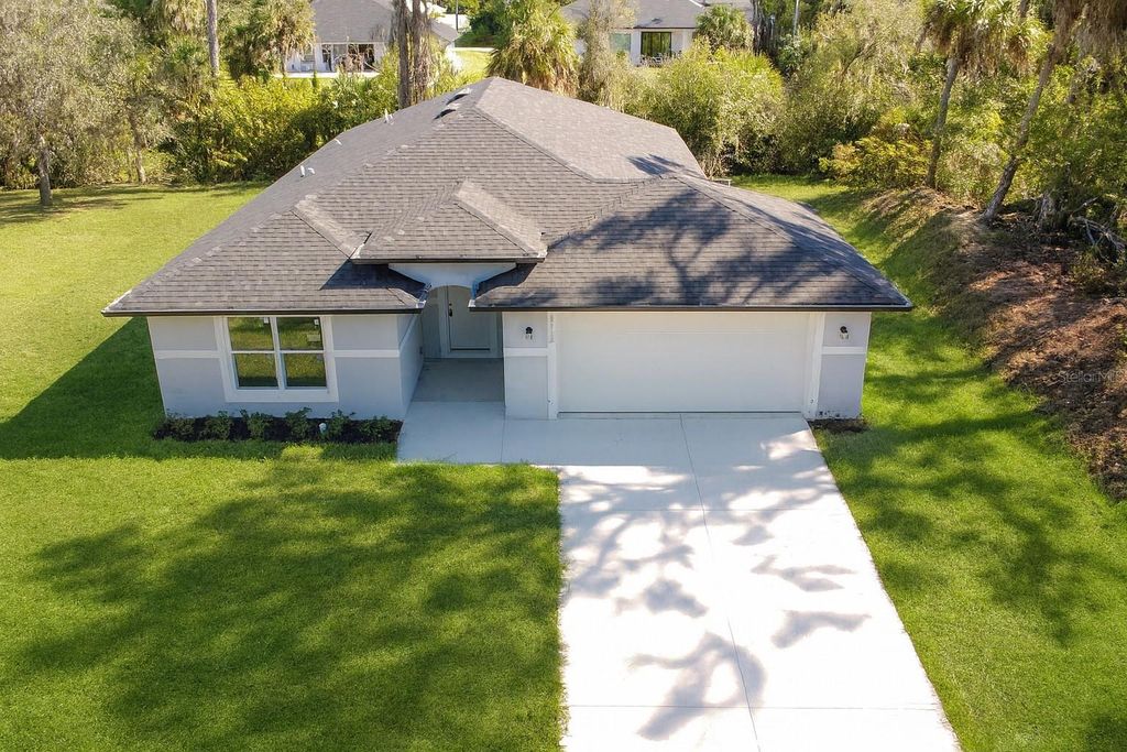 Photo of 3082 Parade Terrace, North Port, FL 34286 (MLS # A4677295)
