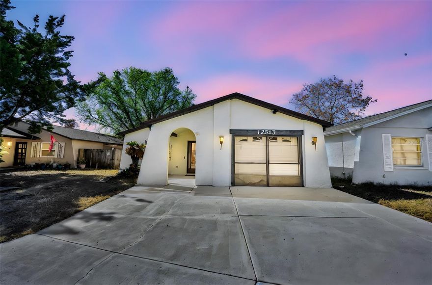 WOW! This is a great home and great location. This Open  2 BR 1 ½ Bath is perfect with oversized 1 car garage & Luxury Vinyl throughout. The Kitchen is beautiful with so many cabinets, pantry and more! Relax  on the Covered and Screened Lanai and the backyard is amazing, it’s so private and over looks a creek in the backyard. It doesn’t get any better than this! Roof is only 3 years new. Centrally located near the Suncoast and close to restaurants, shopping, churches, and all your conveniences. PRESENT ALL OFFERS.