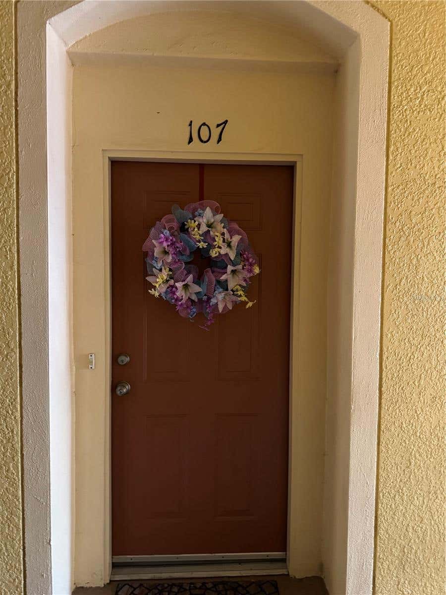 Photo of 6335 Contessa Drive #107, Orlando, FL 32829 (MLS # O6430062)
