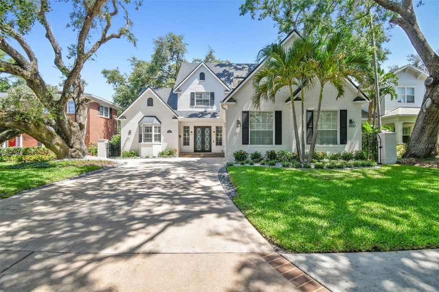 Step into this beautifully renovated 4-bedroom, 3.5-bath home in the prestigious Parkland Estates neighborhood. This two-story residence boasts 3,573 square feet of thoughtfully designed living space, seamlessly blending classic charm with modern upgrades.
Upon entry, you’re greeted by soaring vaulted ceilings and stunning hardwood floors that flow throughout the home. The great room, complete with a wood-burning fireplace, opens to a designer gourmet kitchen, remodeled in 2018. This culinary space is a chef’s dream, featuring a Viking six-burner gas range, a second Viking oven, a built-in wine fridge, a large island, and custom cabinetry with storage and seating. The downstairs primary suite, renovated in 2020, includes a private entrance to the backyard, high ceilings, an oversized walk-in closet, a spa-like bathroom with marble countertops, a large soaking tub, and a custom glass-enclosed walk-in shower. An additional guest bedroom downstairs with an en suite bath, a stylish office with custom built-ins, and an oversized laundry room round out the first floor. Upstairs, a versatile loft space offers the perfect setup for a home gym or study area. Two spacious bedrooms feature custom-built closets and share a newly remodeled Jack-and-Jill bathroom.
Outdoor living is equally impressive with a deep lot featuring a heated pool and spa, a sun shelf, and sophisticated lighting. Trex decking, lush mature oaks, plantation shutters, turfed yard and meticulous hardscaping enhance the private oasis. A two-car garage, a tankless water heater, and recent roof and AC updates (2025, 2024) ensure modern efficiency. Located minutes from premier shopping, dining, Tampa International Airport, and steps from Palma Ceia Golf Course, this home truly has it all. Don’t miss the opportunity to make this exquisite property yours!