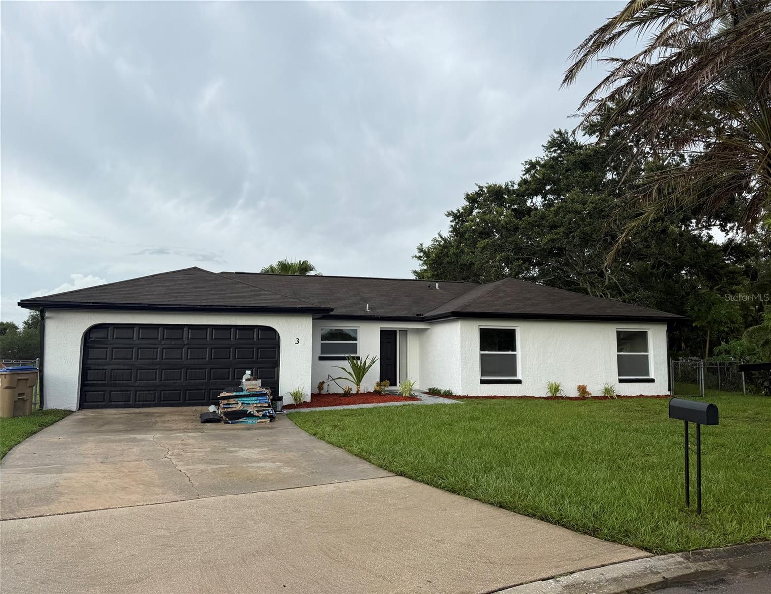 Absolutely stunning and fully renovated! This beautifully updated two car garage home sits on a quiet cul-de-sac and features brand new, roof, windows, LVP flooring, kitchen with quartz countertops, bathrooms, appliances, and much more. Air Conditioner (2019) and water heater (2015) both in excellent working condition. Enjoy the privacy of no rear neighbors and the serenity of a beautiful park behind the home. This property also offers an oversized lot with a screen porch perfect for outdoor entertaining or future additions. No HOA fees. Don't miss this opportunity!!!