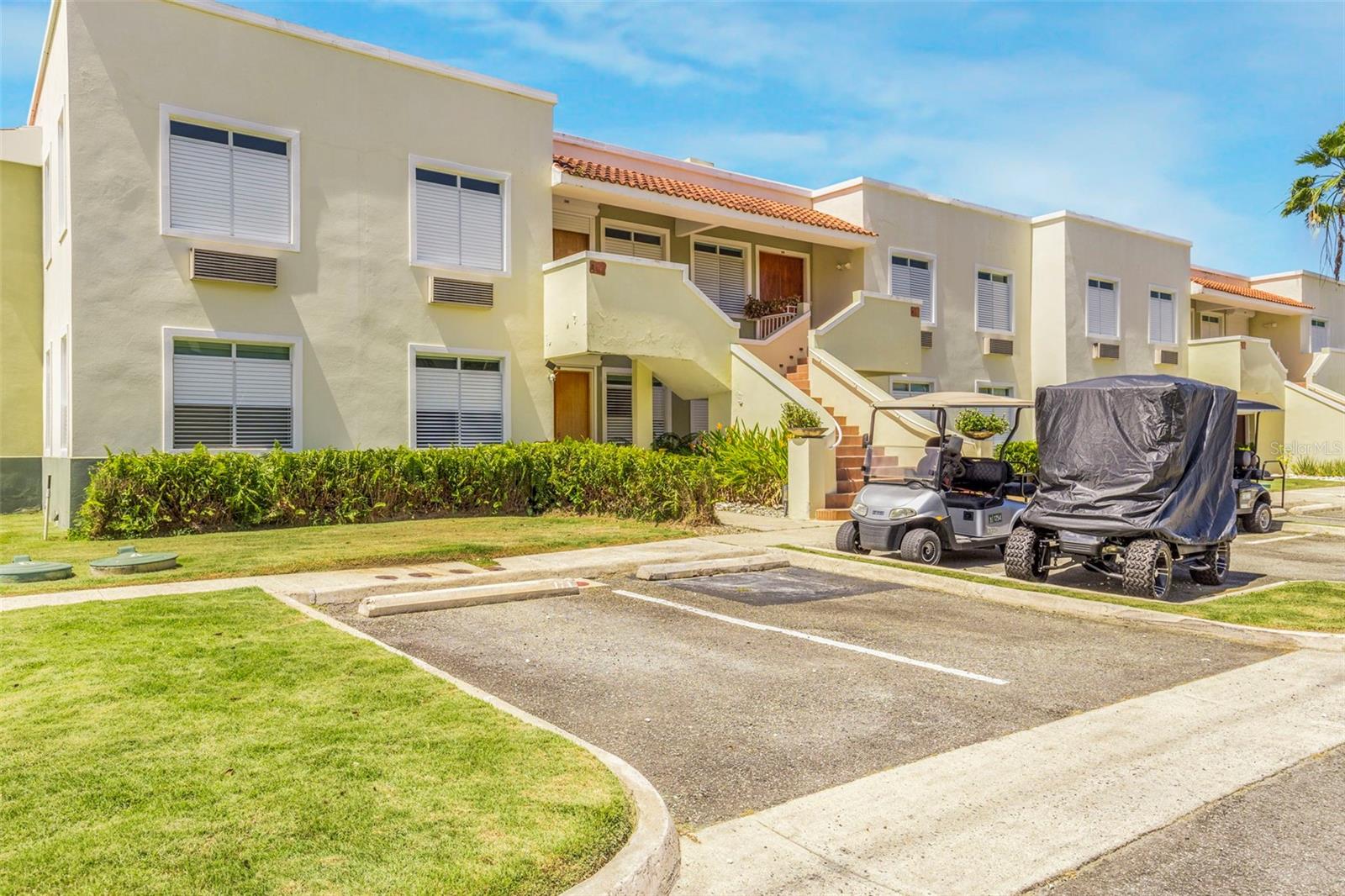 Welcome to this beautifully maintained 3 bedroom, 2.5-bathroom ground floor corner unit in the sought-after community of Harbour Lakes within Palmas del Mar. Priced at $425,000, this spacious residence offers privacy, comfort, and convenience all in one.
Enjoy the ease of hurricane shutters, full electric appliances, and a thoughtfully designed open layout ideal for entertaining or relaxing. The bedrooms are generously sized, each with its own en-suite bathroom, and the unit includes a guest half-bath for added convenience. This property has two assigned parking spots and a golf cart parking.
Located just steps from the community pools and walking trails, this unit is perfect as a primary residence, vacation getaway, or investment opportunity.