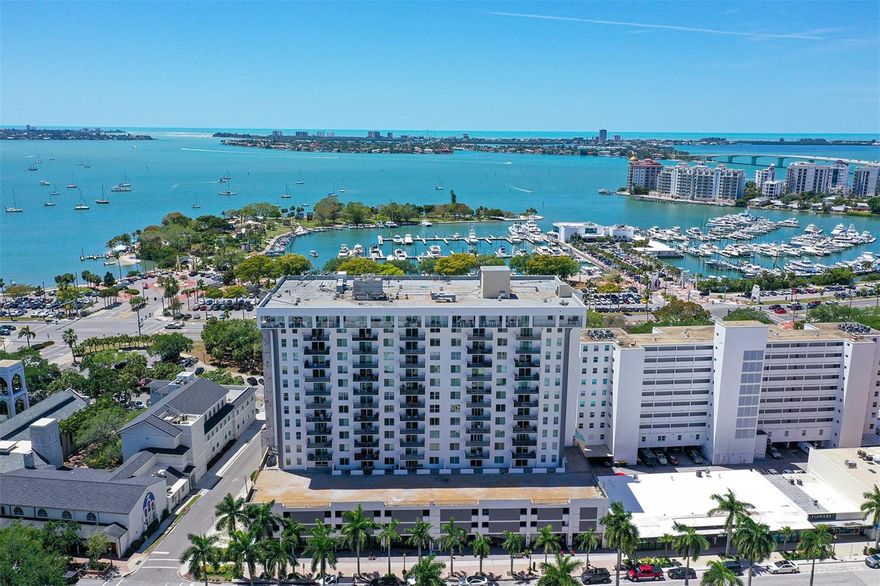 THE BEST CONDOMINIUM VALUE IN THE HEART OF DOWNTOWN SARASOTA, THIS FULL BAY AND SUNSET VIEW UNIT IS PRICED TO SELL! Soak in the sweeping views of the Sarasota Bayfront from this beautifully situated 5th floor, 1-bedroom, 2-full bath residence at The 101 Condominium featuring a great floor plan and spacious bayfront terrace perfect for savoring balmy breezes, breathtaking sunsets, and the lively cityscape. Just a stones throw away from Marina Jack, residents enjoy immediate access to deep-water docking, waterfront dining, and the ultimate boating lifestyle. This light-filled unit has just been completely repainted and is ready for to you enjoy the eat-in kitchen with pass-through to the dining area, a gracious living room, a restful primary suite with ensuite bath and walk-in closet, and a convenient 2nd bath. Enjoy peaceful water views from nearly every room, easy-care ceramic tile flooring throughout, and a brand-new A/C unit for year-round comfort. The 101 Condominium is a premier downtown residence that recently completed an impressive $8 million modernization, including hurricane-rated sliding doors and windows in all units, a newly designed lobby, and extensive structural upgrades. Residents enjoy a rich array of resort-style amenities: heated swimming pool with grill area, state-of-the-art gym and yoga room, library and movie theater, social room, and attentive concierge and on-site maintenance staff. Directly out the back entrance of the property is historic Palm Avenue, lined with art galleries, charming boutiques, and inviting restaurants. And a block away is Main Street for even more dining and nightlife options. Ideally located just minutes from the world-renowned beaches of Lido Key, Longboat Key, and Siesta Key, this residence offers effortless access to Sarasota's most celebrated coastal destinations. This is downtown Sarasota living at it's best!