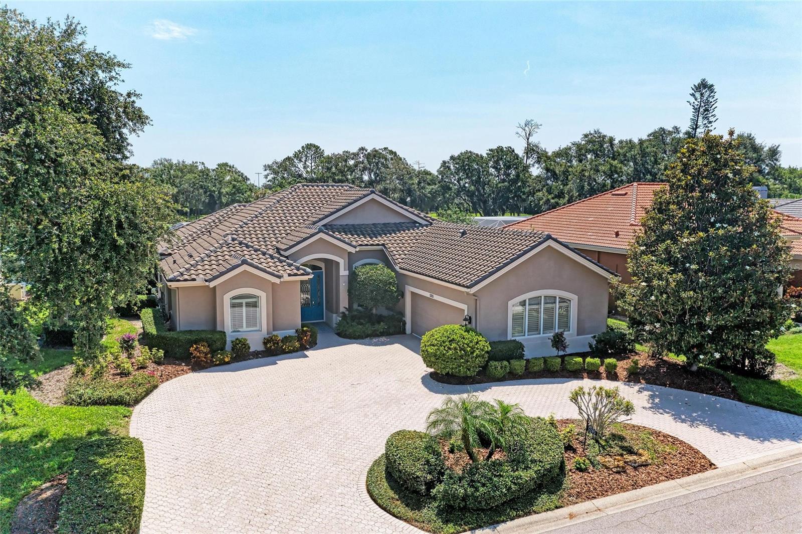 Stunning Golf Course & Water Views!
Welcome to your dream retreat located within the Top-tier Rosedale Golf and Country Club. This property combines luxury and comfort with lush golf course and water views!
As you approach this beautiful home, you’ll be captivated by its curb appeal, circular driveway and meticulously landscaped surroundings. Step inside to discover an open light and bright floor plan, with special features and improvements galore! Some worth mentioning are; new roof 2017, new 2018 & 2022 zoned high efficiency A/C units, new 2022 tankless hot water heater, new 2022 variable speed pool pump & motor, 2019 new pool thermostats & new pool heater, Pool & Spa resurfaced w/Pebble-Tech in 2020, 2025 entire lanai rescreening and change-out of screws completed, 2020 outdoor BBQ completely refurbished, 2020-2021 all new high-end kitchen appliances including washer & dryer, 2025 garage floor texture coating painting completed and added additional shelving, plantation shutters, updated lighting & fans, alarm system, crown molding, surround sound throughout and so, so much more!
The heart of the home is the expansive living area, seamlessly flowing into a gourmet kitchen equipped with modern appliances and ample counter space — perfect for entertaining family and friends. Enjoy fantastic meals indoors or step through the sliding glass doors onto the incredible outdoor oasis.
Your backyard paradise awaits! A magnificent saltwater pool and spa set the stage for relaxation, while the expanded paver brick lanai is designed for both tranquil mornings and lively evenings. Gather around the outdoor kitchen for delightful barbecues or intimate dinners under the stars. The motorized retractable awning extends your enjoyment of this outdoor space, providing shade and comfort at your fingertips. Whether you're seeking an active or a more relaxed environment, Rosedale has something for everyone! With the social membership to the Rosedale Golf & Country Club, you can enjoy amenities of tennis, bocce courts, 22,000 square foot clubhouse with a heated junior-size Olympic swimming pool, fitness center and daily workout classes and access to personal trainers. The Clubhouse features a full-service restaurant that hosts numerous social events and activities throughout the year. For the avid golfer, Rosedale Golf and Country Club offers various levels of golf membership. HOA fees conveniently include cable & internet, 2-24/7 manned gates, and 2 dog parks. A meticulously maintained community located just east of I-75 off SR-70 conveniently located to restaurants, shopping, theater, UTC mall, sporting events, hospitals, Sarasota/Bradenton Airport, great schools, and some of the best beaches in the Country! No Mandatory Memberships, No CDD fees here!