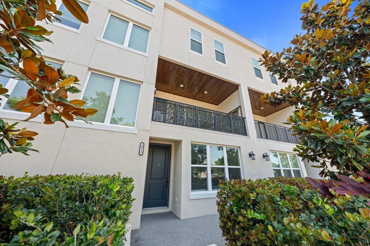 Available for Rent or Purchase! Modern Luxury in the Heart of Seminole Heights! Welcome to Magnolia Terrace Townhomes, where contemporary design meets unbeatable location. Built in 2021, this stunning multi-level townhouse offers the perfect blend of style, comfort, and functionality. The first floor features a private bedroom with its own en-suite bathroom—ideal for guests or a home office—along with a spacious two-car garage offering ample storage. Upstairs, the second level is an entertainer’s paradise. A sprawling open-concept living area flows seamlessly into a chef-inspired kitchen, equipped with a 36” gas range, stainless steel appliances, pot filler, and elegant Calacatta quartz countertops. Step out onto the oversized balcony to enjoy gorgeous Tampa sunsets, perfect for evening gatherings or quiet relaxation. The third floor offers peace and privacy with two master suites and a convenient mudroom. Every detail has been carefully considered, from the hurricane-rated windows and doors to the luxury vinyl plank flooring throughout. Added perks include front and rear security cameras for peace of mind. Located in the vibrant heart of Seminole Heights, you're just a short stroll to local favorites like Nebraska Mini Mart, Ella’s Americana Folk Art Café, Olde Heights Bistro, and Southern Brewing. Downtown Tampa is just 7 minutes away, with Tampa International Airport only 15 minutes out, and some of the nation’s top-rated beaches within a 40-minute drive. Don’t miss your chance to own a modern gem in one of Tampa’s most sought-after neighborhoods!