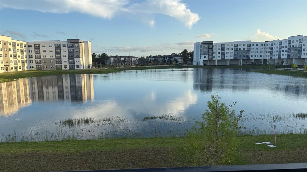 Photo of 5579 Millenia Park Boulevard #201, Orlando, FL 32839 (MLS # O6425002)