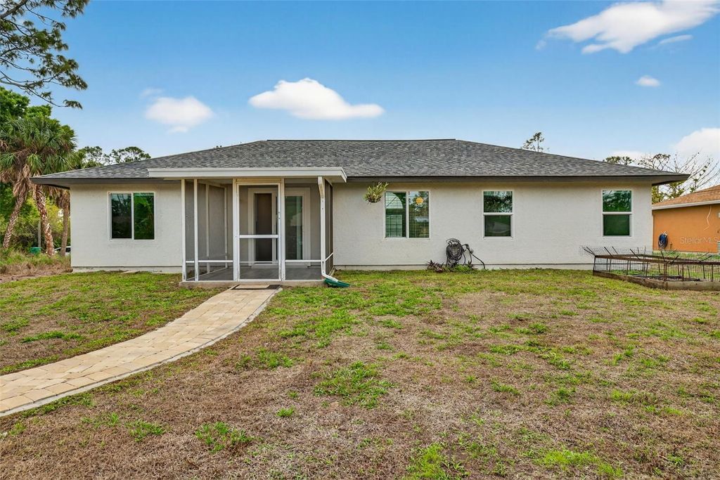 Photo of 18322 Eblis Avenue, Port Charlotte, FL 33948 (MLS # A4687730)