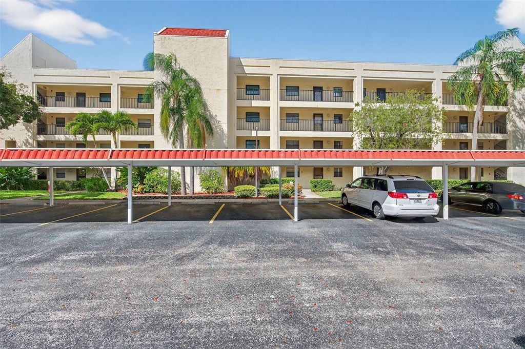 Photo of 11485 Oakhurst Road #A202, Largo, FL 33774 (MLS # TB8435378)