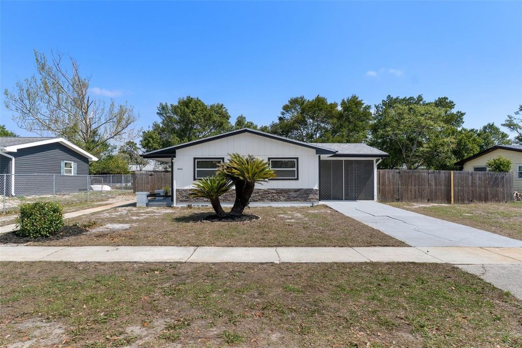 Photo of 4668 Crescent Road, Spring Hill, FL 34606 (MLS # W7883772)