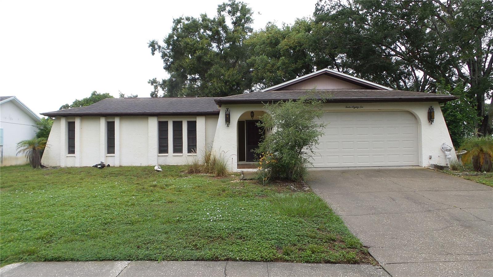 This charming 2 bedroom, 2 bath lake front home is perfect for a temporary one year rental! It's the perfect place to call home for 12 months with consecutive renewal encouraged. This home a solidly built and has been well maintained. The rear Florida room gives you tons of extra space to stretch out. Walk down to the small lake from your cozy backyard to play with the ducks! Just kick off your shoes and relax. You just found the perfect spot!