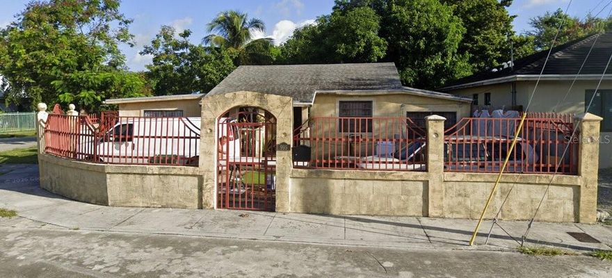 Calling all investors, flippers, and visionaries! *Motivated Seller* This 3-bedroom, 1-bathroom home is brimming with renovation potential and ready for its next chapter. Sold as-is, this property is the ideal fix-and-flip or long-term investment opportunity in a convenient Miami location near sought-after magnet schools. Step inside to find tile flooring throughout, a kitchen featuring charming wood cabinets and a convenient breakfast bar. Age or condition of the roof & AC wall units are unknown. Outside is where this property truly shines. A large metal wall and gate surround the entire property, offering exceptional privacy and security. Two separate large double-door gate entrances provide flexible access and generous parking options. You'll also find elegant French doors that add character and natural light, which opens to a sprawling & spacious private yard, perfect for entertaining, outdoor living or creating a large garden oasis. The property also includes attached and detached structures, including an ADU and storage units, that may carry violations — presenting even more upside for the savvy buyer willing to do their due diligence. No assignable contracts.