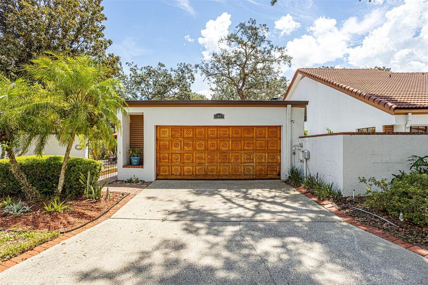 Fall in LOVE with this beautiful maintained 2 bedroom, 2 bathroom home with WATER ACCESS in Temple Terrace! This stunning unit welcomes you with a brick courtyard and soothing sounds of a tranquil water fountain. Step inside to discover a thoughtfully designed interior featuring granite counter tops in the kitchen, a double sided fireplace, and an abundance of natural light. The primary suite offers a luxurious en-suite bathroom complete with spa like walk-in shower and relaxing soak tub - perfect for unwinding. Both bedrooms offer direct access to a serene, private patio courtyard surrounded by lush landscaping. This community is on the RIVER. It includes a 7 acre park that’s GATED for its residents ONLY. Enjoy the POOL, GAZEBO on the river, walking TRAILS, and TENNIS courts. This home is located close to the Temple Terrace Golf and Country Club, enjoy easy access to highway I-75, USF, and plenty of restaurants and shopping. This home you won’t want to miss! Reach out for your private showing today.
