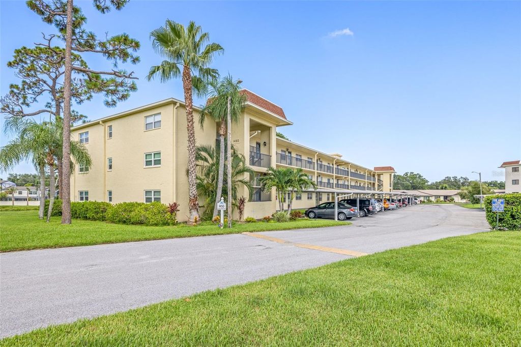 Photo of 1450 Heather Ridge Boulevard #305, Dunedin, FL 34698 (MLS # TB8411350)
