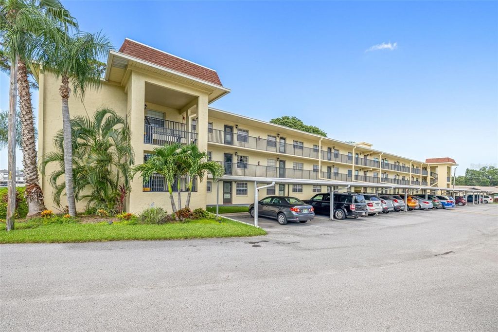 Photo of 1450 Heather Ridge Boulevard #305, Dunedin, FL 34698 (MLS # TB8411350)