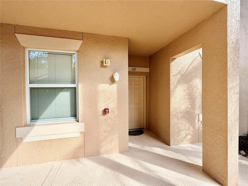 Photo of 819 Fairwaycove Lane #102, Bradenton, FL 34212 (MLS # A4699379)