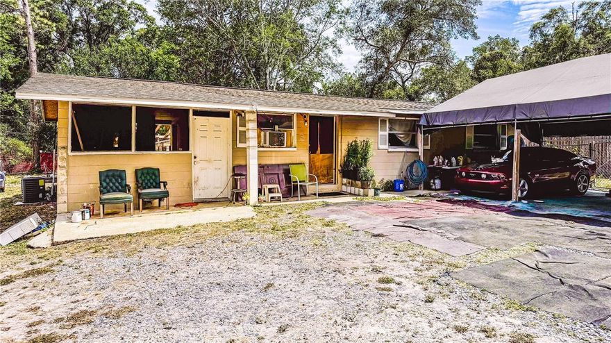 INVESTOR ALERT! CASH ONLY, SOLD AS-IS! Concrete block 2 bedroom / 1 bathroom home on .46 acre lot. Enclosed carport with separate laundry area provides additional storage. Fully fenced yard.