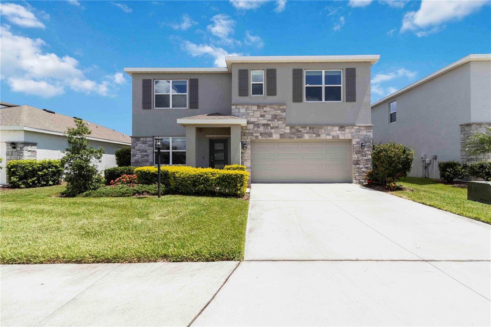 Seller offering a 2/1 rate buydown with full-price offer — a value of $11,351.28! That means lower monthly payments for the buyer:
? Year 1: 4.5% interest rate
? Year 2: 5.5% interest rate
? Year 3–30: 6.5% fixed interest rate
Modern comfort meets exceptional community living in this spacious 5-bedroom, 3-bathroom home located in the vibrant, gated neighborhood of Star Farms at Lakewood Ranch. Built in 2022 by D.R. Horton, this thoughtfully designed Hayden model offers over 2,670 square feet of living space across two levels — ideal for growing families, remote workers, or anyone who loves to entertain.
Step inside to find an inviting open-concept layout that blends the kitchen, living, and dining areas seamlessly — perfect for gatherings or quiet evenings at home. The kitchen is the true heart of the home, featuring quartz countertops, stainless steel appliances, a large center island, and modern lighting accents. Durable luxury vinyl plank flooring adds warmth and style throughout the main areas.
The first floor includes a flex bedroom and full bathroom, ideal for guests or a home office. Upstairs, the spacious primary suite includes an en-suite bath and walk-in closet. Three additional bedrooms and a versatile bonus loft offer room for a playroom, media space, or home gym.
This home is built with concrete block construction on both levels and includes smart home technology, alarm wiring, and a generator connection in the 2-car garage. The screened, covered lanai overlooks landscaped greenbelt views — perfect for enjoying Florida’s year-round sunshine in comfort and privacy.
Located in Star Farms, a master-planned, resort-inspired community in Lakewood Ranch, residents enjoy world-class amenities including a clubhouse café, multiple pools, fitness center, pickleball courts, dog parks, and scenic nature trails. Just minutes from shopping, dining, golf, and Florida’s award-winning Gulf Coast beaches.
Bonus for families: the brand-new East Lake K-8 School is opening this August, located just minutes away — adding even more value to this already incredible location.
This is more than just a house — it’s a lifestyle. Move-in ready and built for the future, this home offers the best of Florida living. Schedule your private showing today!