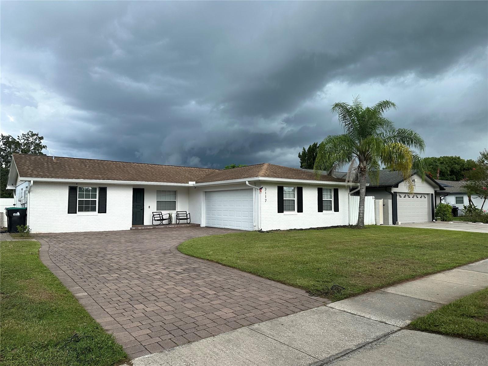 Impeccably maintained and extensively updated, this 3-bedroom, 2-bath home is located in a quiet, established Winter Park neighborhood with no HOA. Recent improvements include brand-new luxury vinyl plank flooring throughout (August 2025), fresh interior paint, a fully remodeled guest bathroom (2024), updated kitchen accessories, and a paver driveway added in 2021. Major systems have been upgraded, including a newer roof (2017), HVAC (2021), and water heater (2021). The home features fully paid-off 2021 Tesla solar panels, contributing to very low energy bills and long-term efficiency. Inside, the home offers a bright, functional layout with modern touches, while the large backyard provides ample space to design a custom resort-style pool or outdoor living area. Located minutes from Park Avenue, top-rated schools, shopping, dining, and major highways. A newly completed $1.2M luxury pool home directly behind the property, with three additional high-end homes under construction, highlights the strong growth and investment potential of this highly desirable location. Take advantage of this rare opportunity to own a move-in-ready home in one of Central Florida’s most appreciating communities.