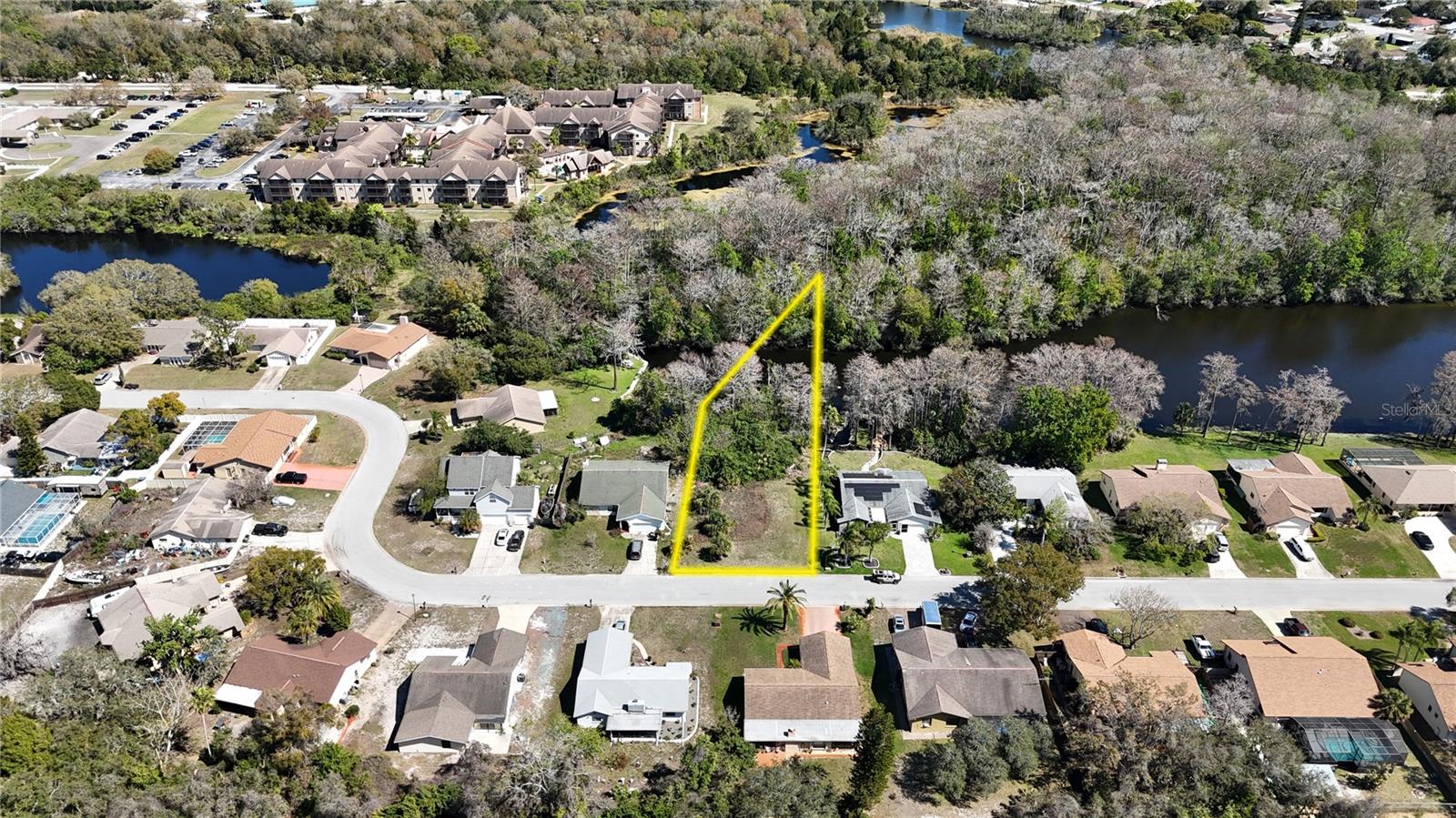 Serene Waterfront Homesite on a Chain of Freshwater Ponds – Near the Gulf Coast
Discover the perfect setting for your dream home on this cute residential homesite, nestled along a scenic chain of freshwater ponds in an established Florida neighborhood. Offering tranquil water views, this unique property provides the ideal balance of nature, and accessibility. Waterfront Location allows direct access to a series of picturesque freshwater ponds, perfect for fishing, kayaking, and birdwatching. Ample space to build your custom home, with room for outdoor living, a private dock, or lush landscaping. Just minutes from the Gulf Coast, offering easy access to white sandy beaches, boating, and vibrant seaside communities. Utilities ready, essential utilities available are nearby for hassle-free development. Whether you’re looking for a full-time residence, vacation getaway, or investment opportunity, this waterfront homesite offers the best of both worlds—freshwater tranquility with coastal excitement just around the corner.
Don’t miss this rare opportunity to own a slice of paradise! Call today for more details or to schedule a viewing.